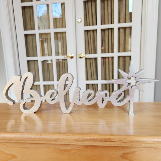 Free-standing wood Believe sign